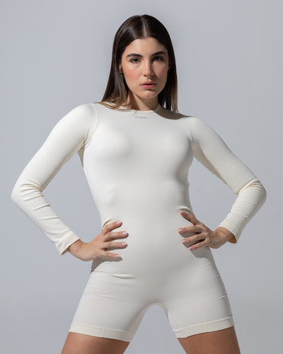SEAMLESS RIBBED SUNSET LONG-SLEEVE ONESIE