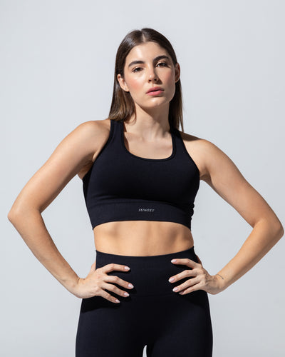 SEAMLESS RIBBED SUNSET BRA TOP — BLACK