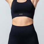 SEAMLESS RIBBED SUNSET BRA TOP — BLACK